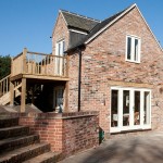 A brick house with a patio