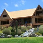 A cabin with beautiful landscaping